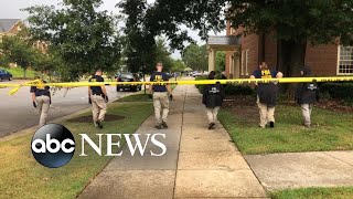 Federal investigators comb over the VA Beach crime scene