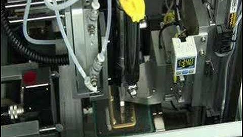 Precision Vision Guided Alignment of Macro Lens