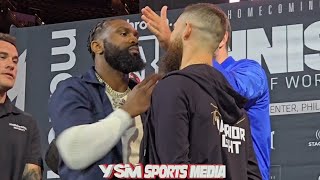 Jaron Ennis moves Eddie Hearn aside during Intense Face-off with Cody Crowley