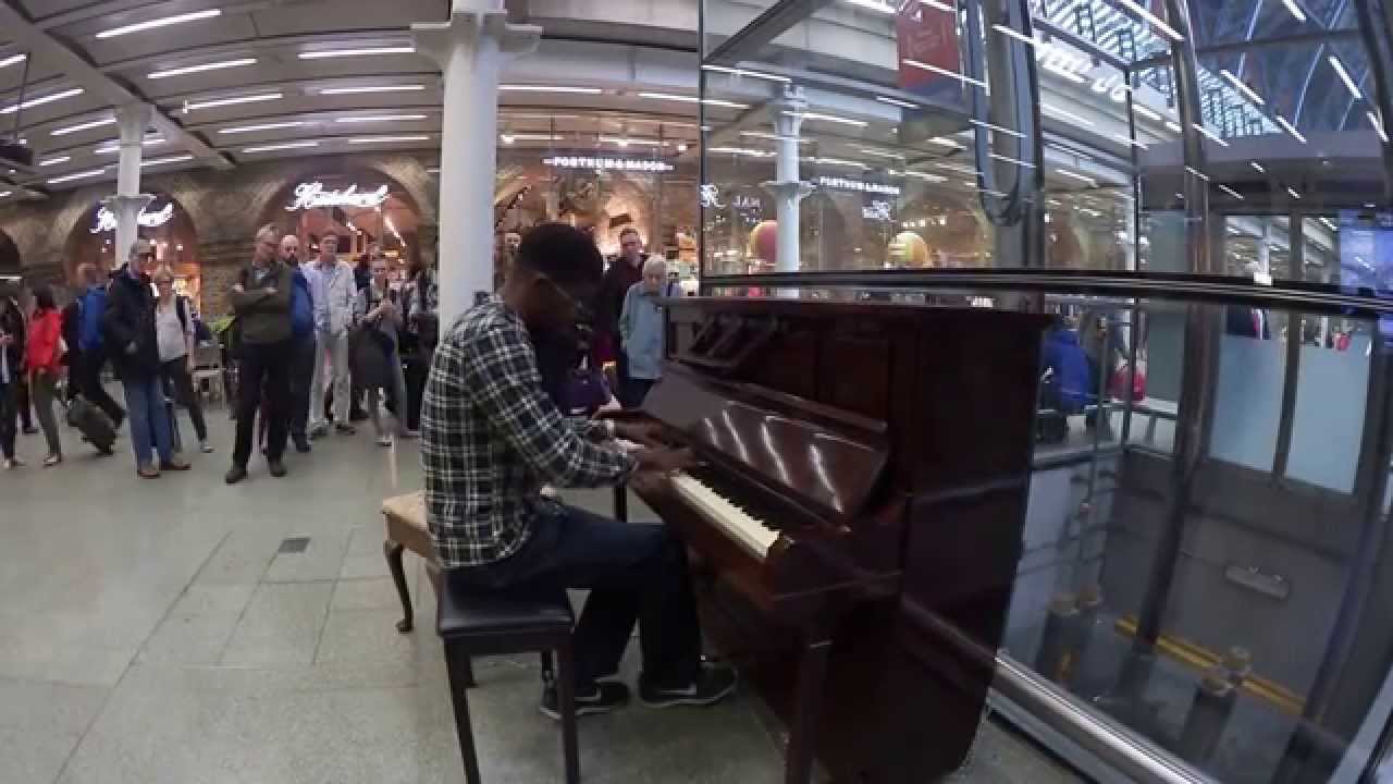 LONDON UK EPIC PUBLIC PIANO PLAYER AT ST PANCRAS STATION YouTube