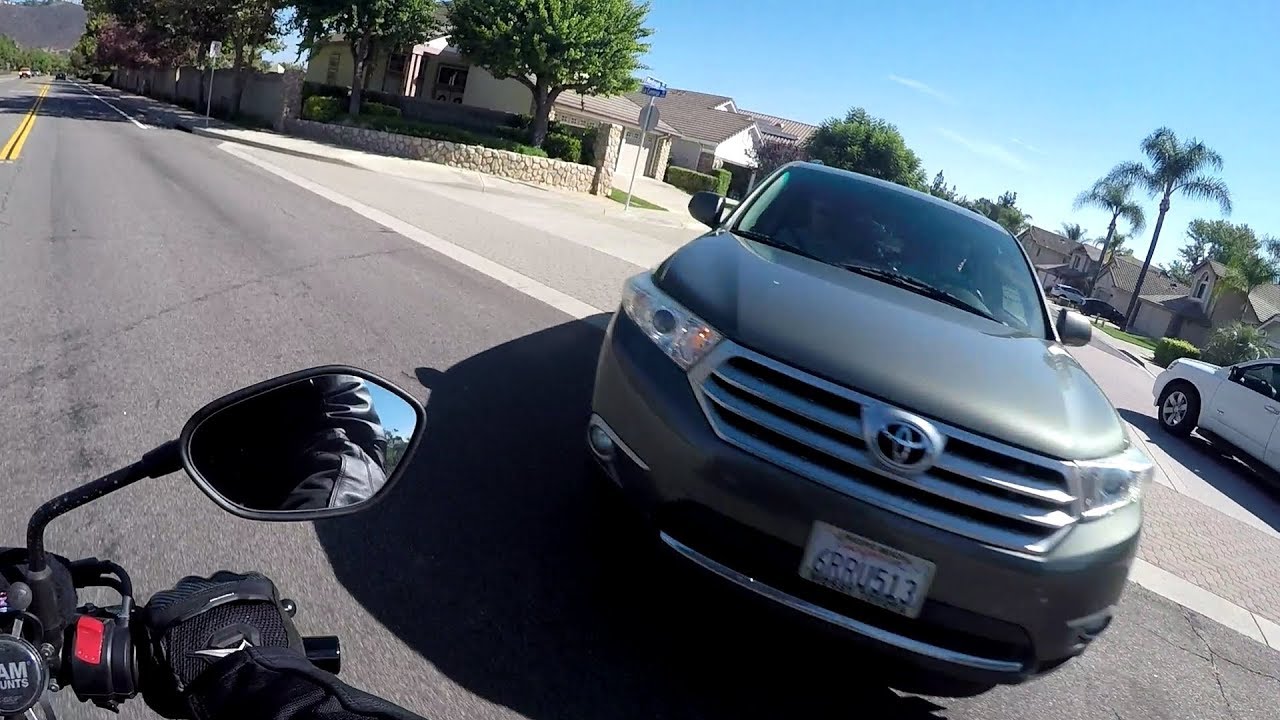 Stupid Driver| Guy in Toyota SUV pulls out almost hitting passing biker| San Marcos