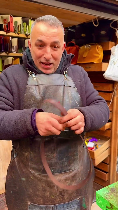 BEST SOUVENIR IN LONDON at Camden Market - a handmade belt with keychains! ￼