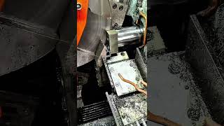 Download Lagu Circular saw bites metal bar coolant flows shavings scatter MP3
