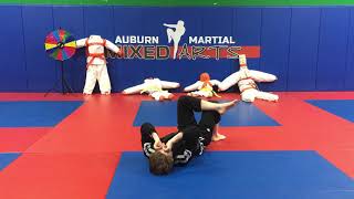Double under hook guard pass to stack choke