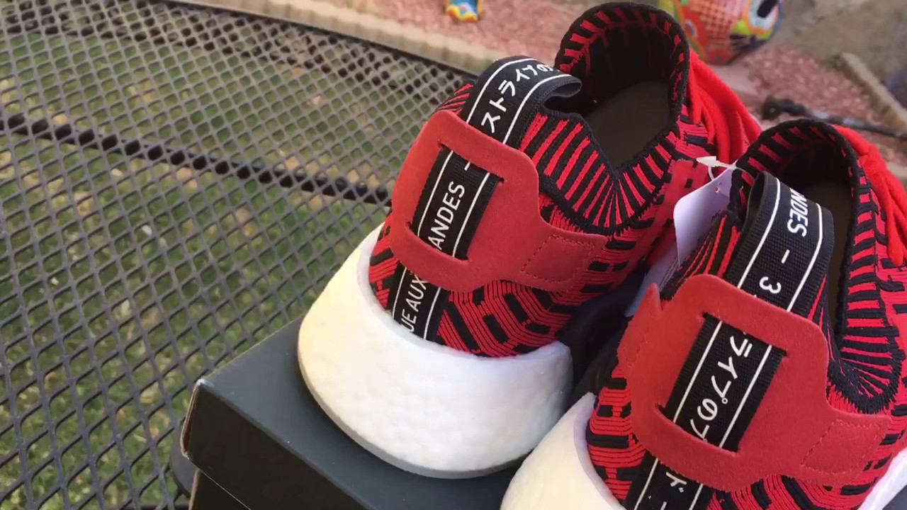 nmd r2 primeknit black red