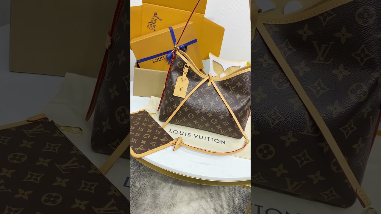 The CarryAll PM handbag in Monogram canvas with natural leather trim is a go-everywhere city bag