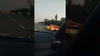 Godzilla chases McLaren on the highway❕