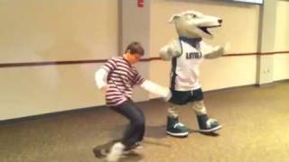 10 years old impromptu dancing with mascot at Loyola basketball game