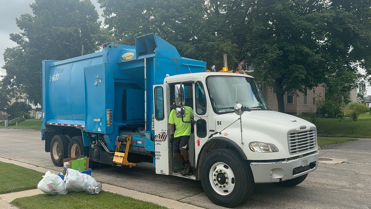 Faherty inc Freightliner Labrie expert garbage truck on manual recycling 