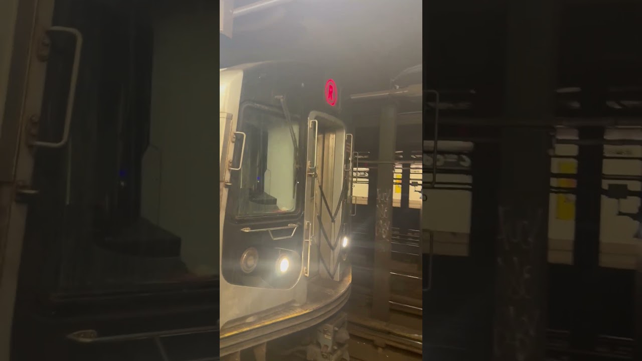 R train arrives at 65th street