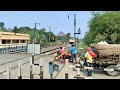 Bike Passing Under Railgate : gateman Loud Shouting Trains Dangerous Speedy Moving Level Crossing