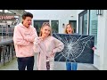 PRANKING MY FAMILY THEN GIVING THEM CHRISTMAS GIFTS!!