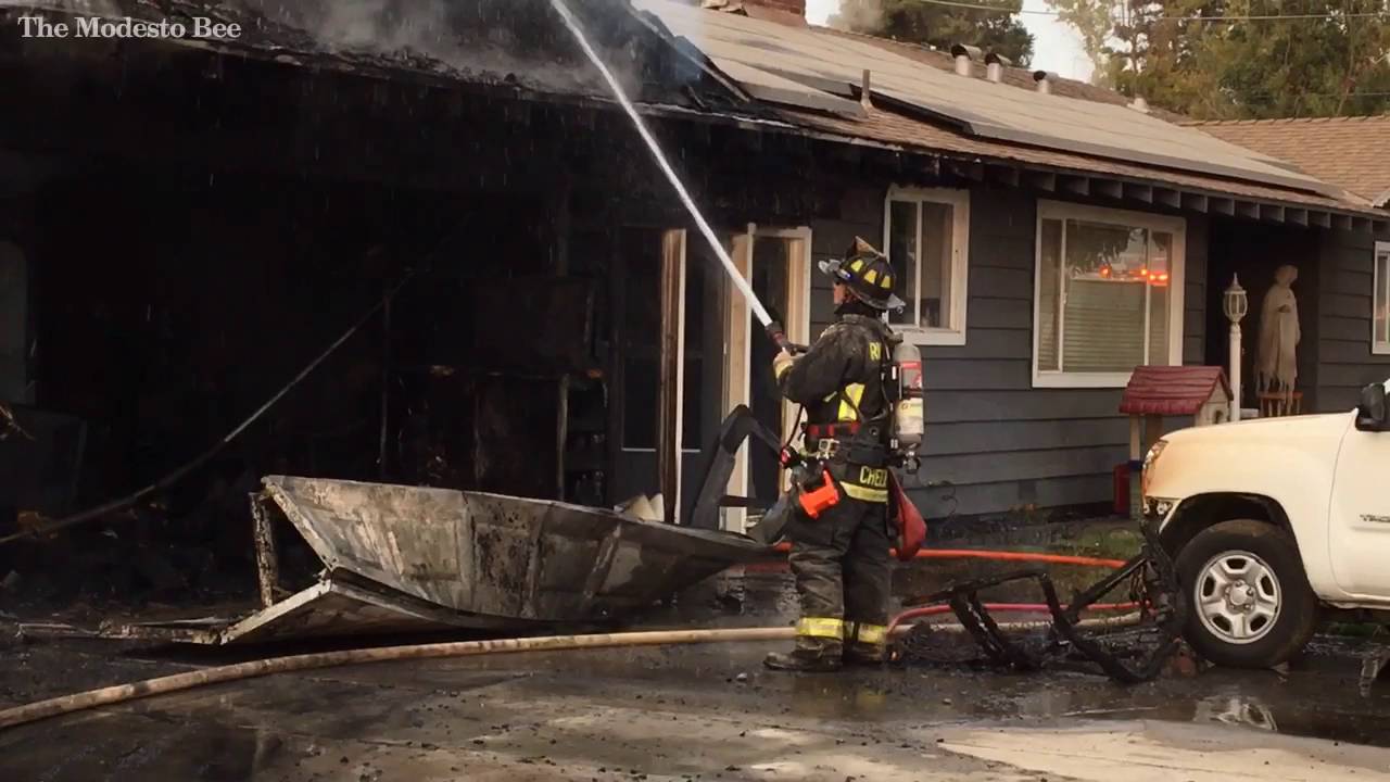 Two alarm fire damages Wood Colony home - YouTube