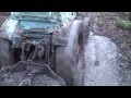 Forest traktor T-40 off road in deep mud. Лес Трактор Т-40 на дороге в грязи