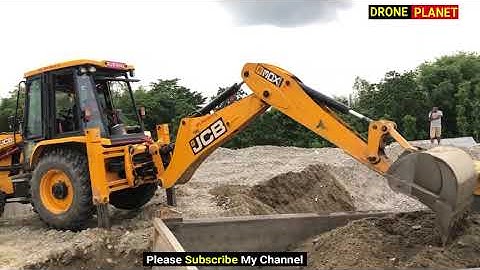 JCB Backhoe Loading on Mixed Ballast Tipper in Crusher Industry