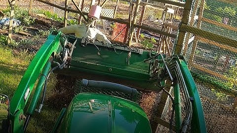 Moving 11 loads of 🪵wood chips/mulch🪵 with John Deere 2320 54" bucket to Elizar