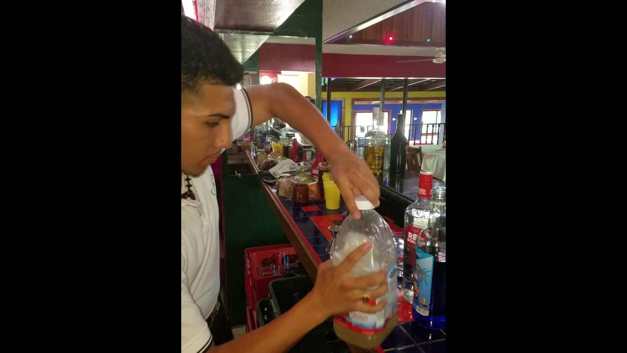 Blue Kamikaze on the rocks Belize Mixology style.