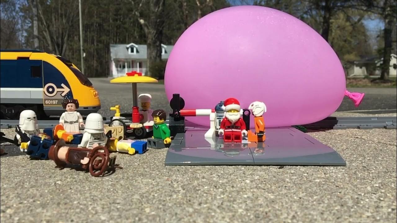 Lego train crashes into a large water balloon YouTube