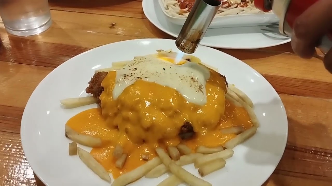 Melting cheese with a blowtorch 