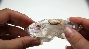 Water Bubble inside of a Quartz / Amethyst specimen from Goboboseb Mountain, Erongo Region, Namibia
