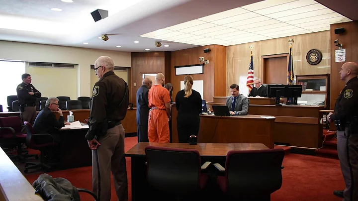 Prosecutor Kathryn Norton reads a statement on beh...