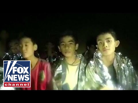 13 trapped in Thailand cave in stable condition