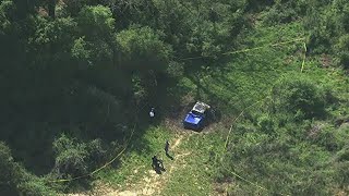 Two bodies found inside burning car in Spalding County