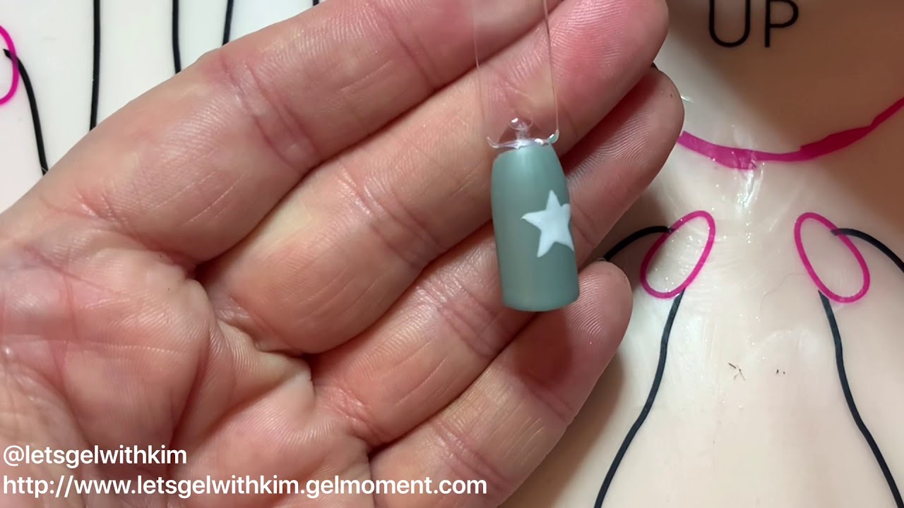 6. Step-by-Step Guide to Creating Star Nail Art - wide 3