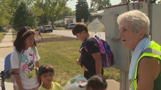 As temps soar, 87-year-old suburban crossing guard gives ice cream to kids