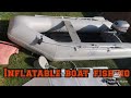 Inflatable boat fishing setup with a mariner 15hp outboard