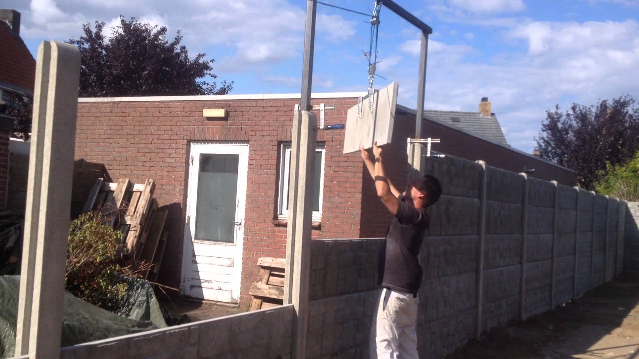 zware beton schutting plaatsen met hefboom