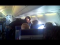 Cop physically pulled white women off plane. Arrested off the plane. copyright