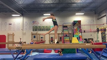 Switch leap connected directly to a back tuck split jump on beam. Erin Flynn class of 2023