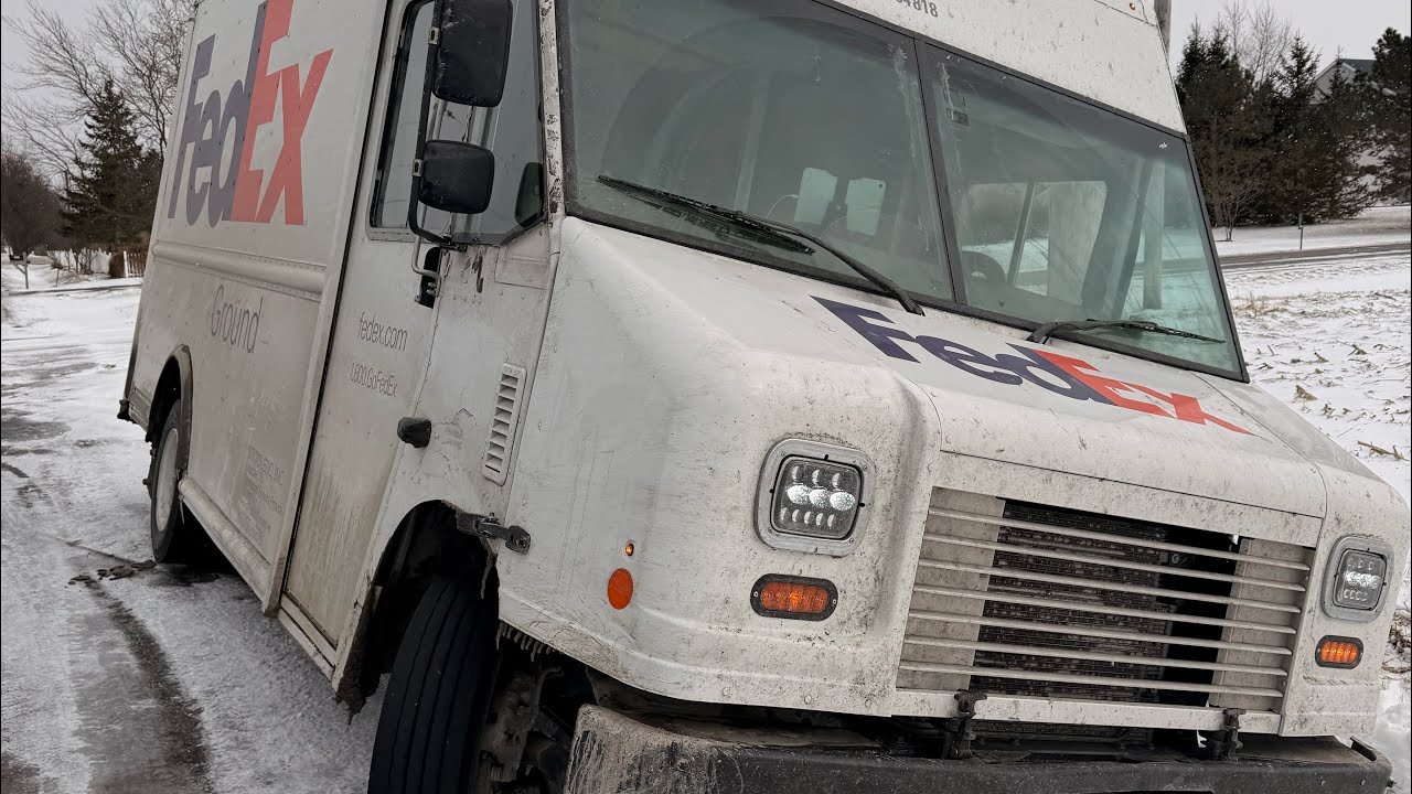Winching a fedex box truck out of a ditch. You can’t park there!!!