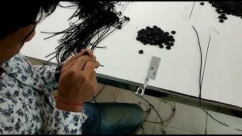 Drawstring stopper insert through folder