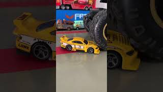 Racing Car Vs Monster Trucks