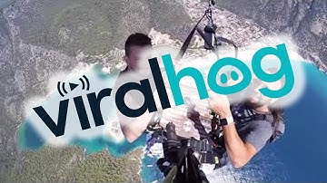 Paragliding Pals Play Backgammon From High Above || ViralHog