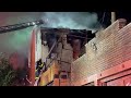 Crews battle west Baltimore rowhome fire