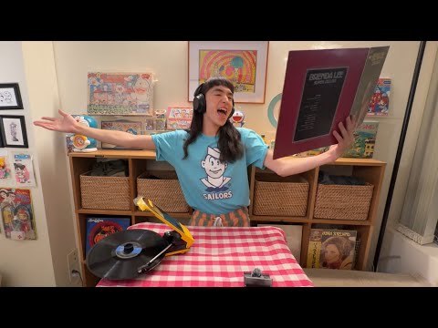 Dopagaki, buying and touching a record for the first time.