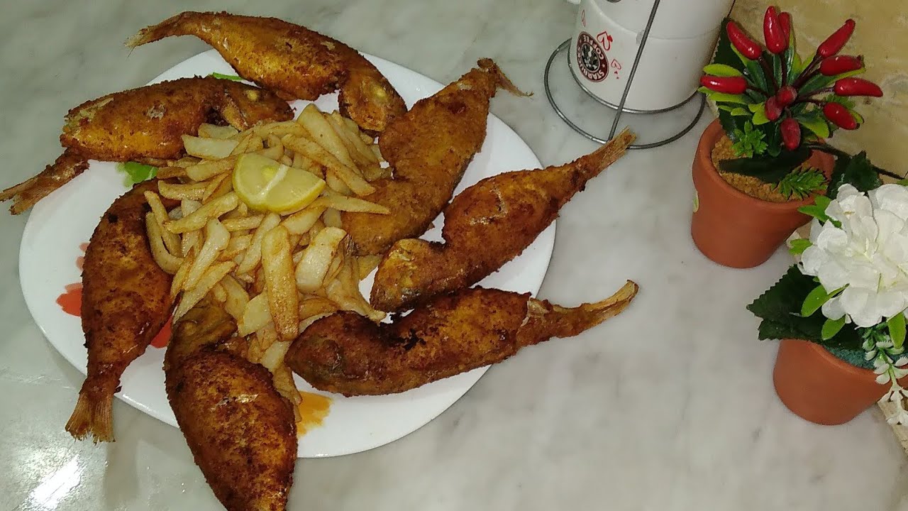 طريقة تنظيف سمك الباجو مع تتبيلة رهيبة والسر في القلي حتى لا يشرب الزيت