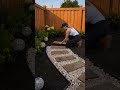 Created a beautiful winding path with stepping stones and river rocks  #backyardtransformation