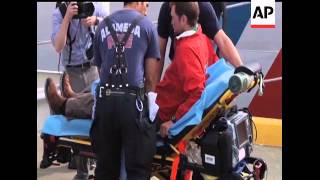 Two injured sailors from a yacht that''s racing around the world reached land on Monday. The U.S. Co