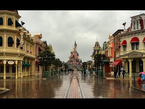 Disneyland Paris in the Rain - Main Street, Castle, Dragon, & Buckets...