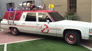 Ghostbusters (2016) Ecto-1 and Ghostbusters (1984) Ecto-1 Meet Outside Ghost Corps HQ