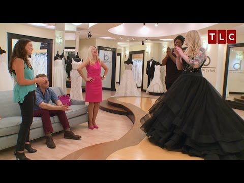 black wedding dress on the beach