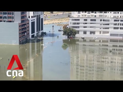 What caused the UAE's rare torrential rains?