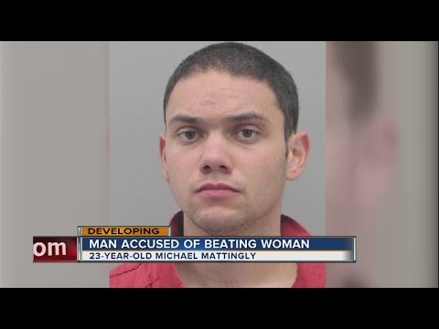 Man arrested after slamming woman to the ground and kicking her