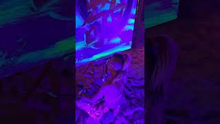 Signing Blacklight Painting