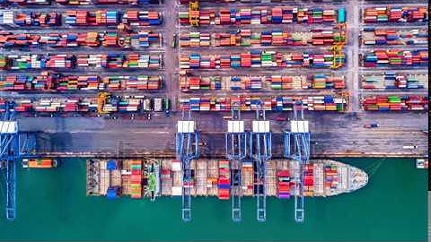 stock footage  k timelapse of modern industrial port with containers from top view or aerial view it