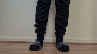MCM VISETOS RUBBER SLIDES BLACK WHITE ON FOOT
